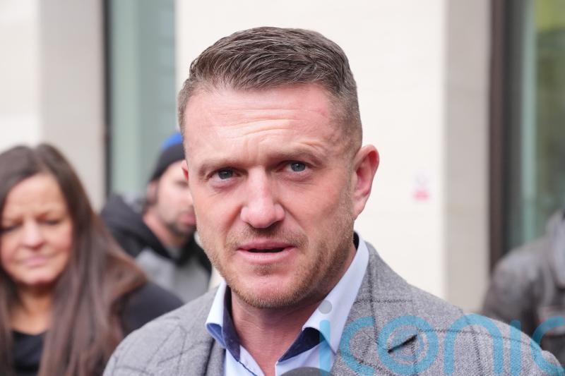 Tommy Robinson cleared of refusing to leave march after police paperwork error