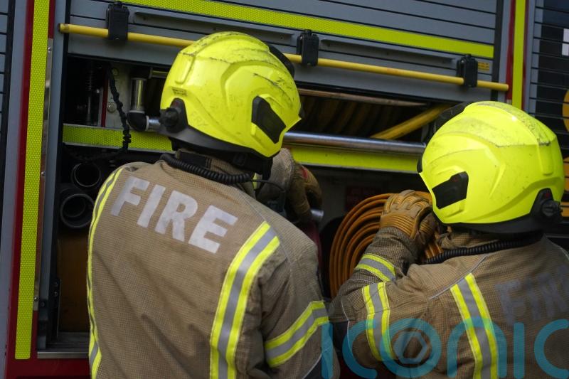 Person in hospital after fire breaks out at housing complex