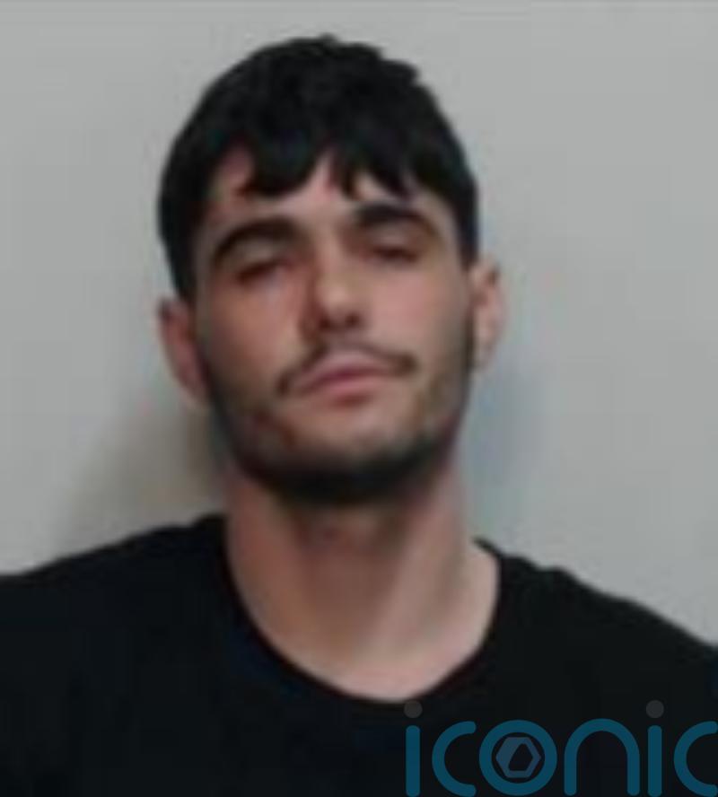 Police hunt prisoner who fled from guards during funeral