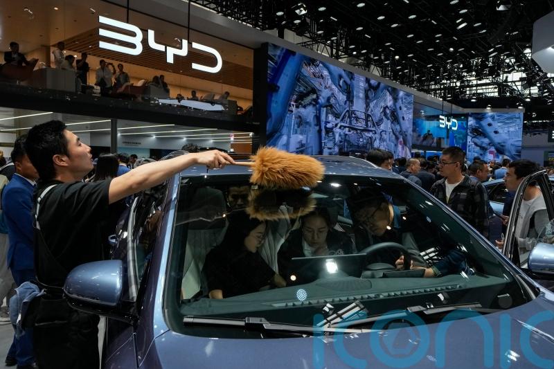 Tesla founder Musk visits China as competitors show off new electric vehicles