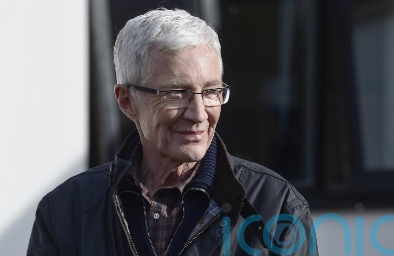 Paul O’Grady’s widower took their dogs for a final goodbye before his burial