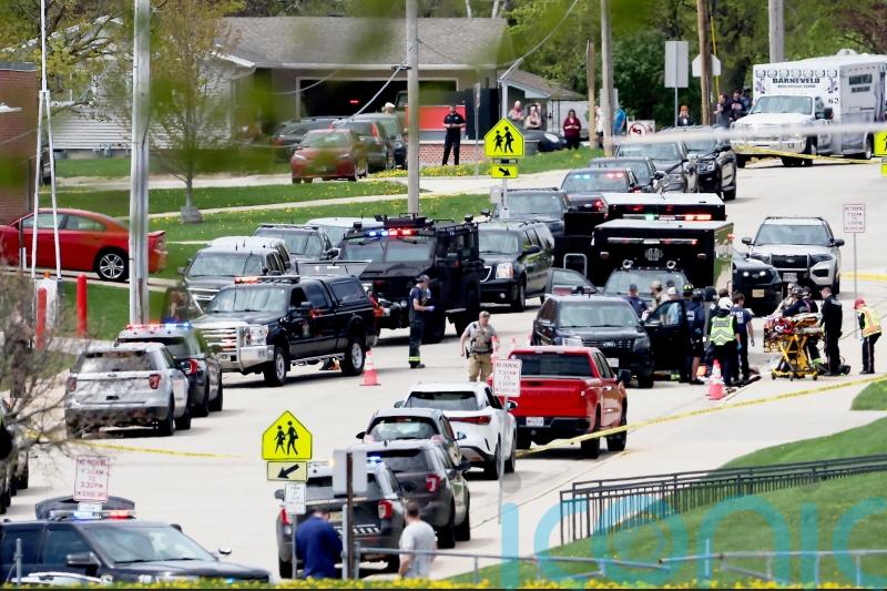 Authorities in Wisconsin say gunman ‘neutralised’ outside school