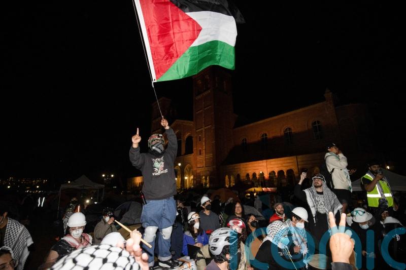 Pro-Palestinian protesters defy police orders to remain on US campus