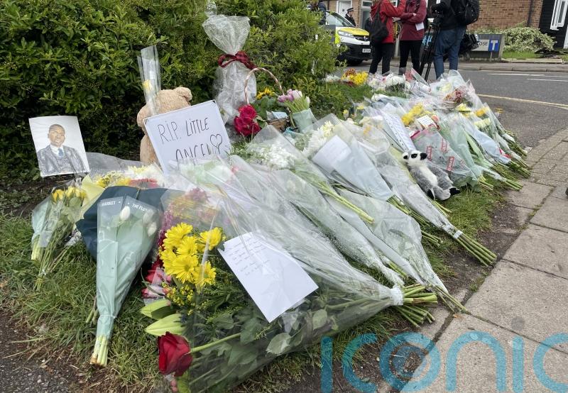 Sword attack victim ‘had headphones in’ and did not hear warnings – neighbour