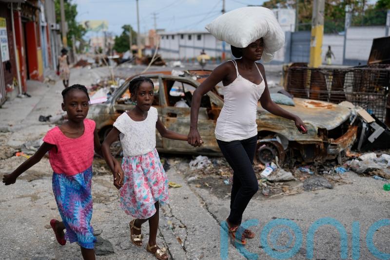 Gangs lay siege to neighbourhoods in fresh outbreak of violence in Haiti