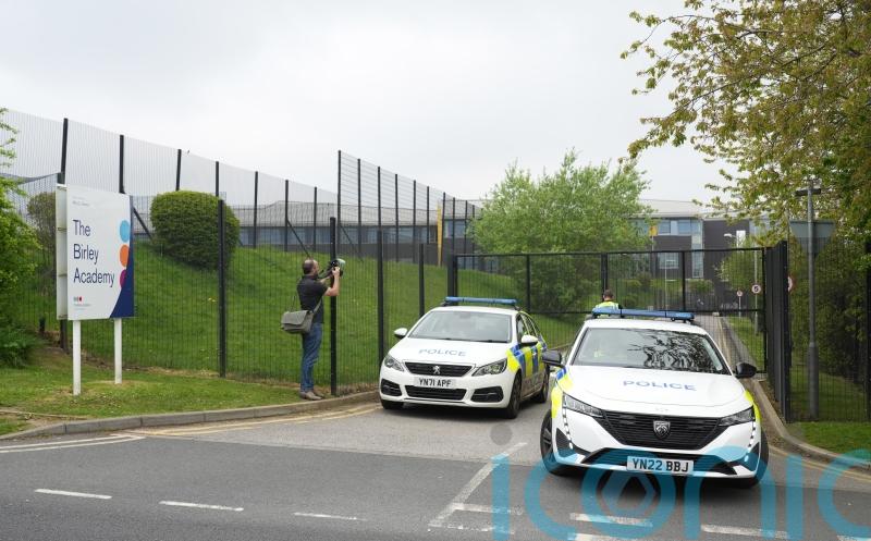 Boy, 17, charged over school attack which left three people injured