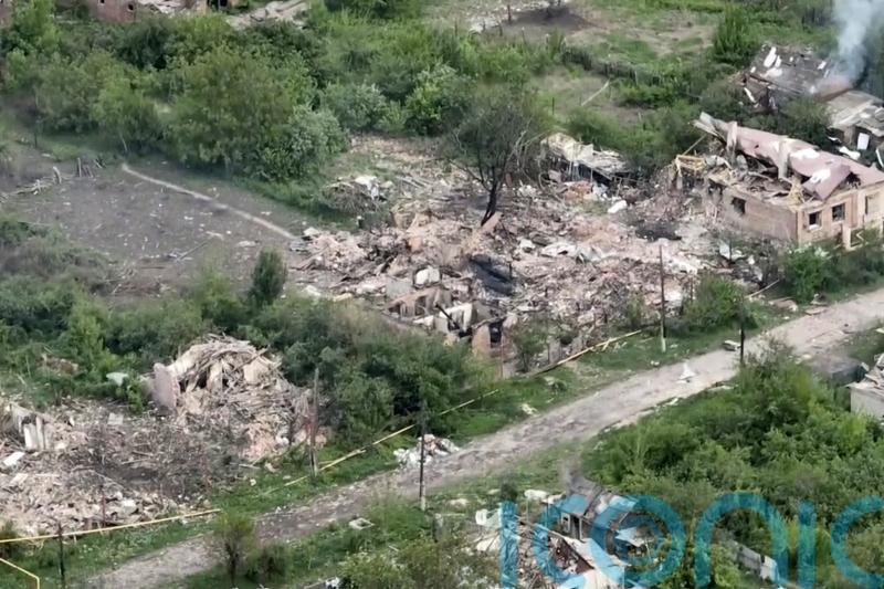 Drone footage shows damage in Ukraine village as residents flee Russian advance