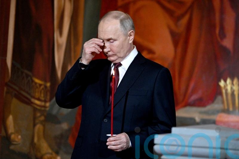 Putin among the worshippers in Moscow as Russia celebrates Easter