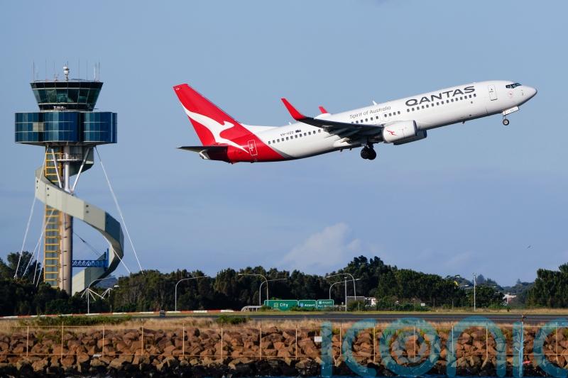 Qantas agrees to payouts for selling seats on cancelled flights