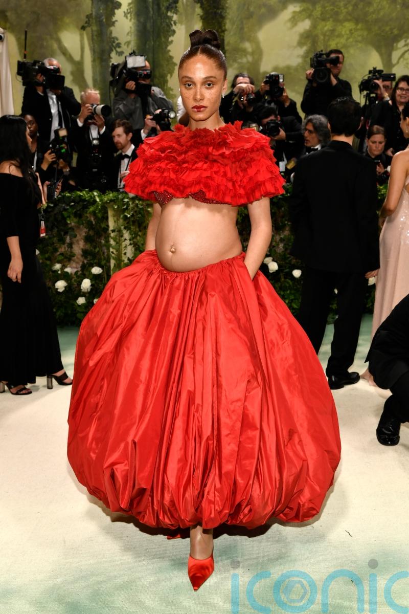 British model Adwoa Aboah highlights pregnancy with two-piece Met Gala gown