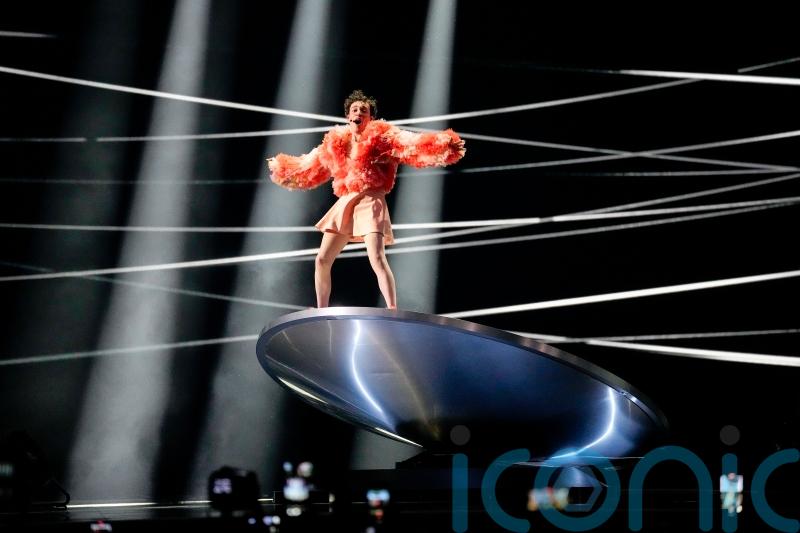 Switzerland’s Nemo balances on metal disc during Eurovision performance