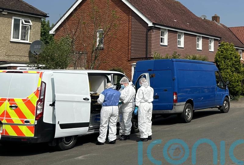 Man held after police officer shot with crossbow following reports of stabbing