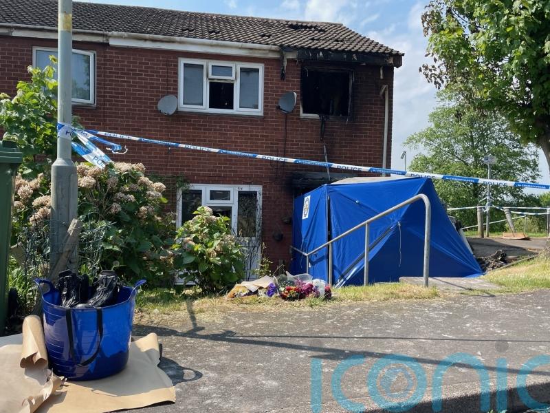 Third man arrested after two women killed in house fire
