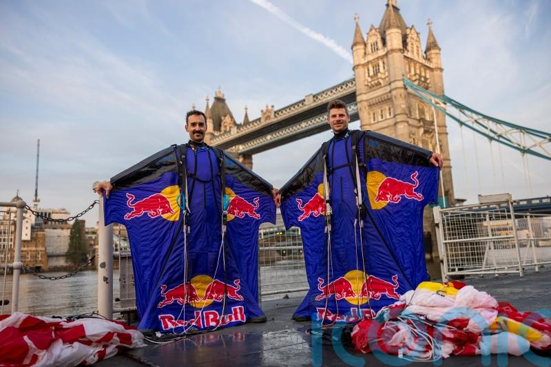 Skydivers achieve ‘dream’ by completing wingsuit flight through Tower Bridge