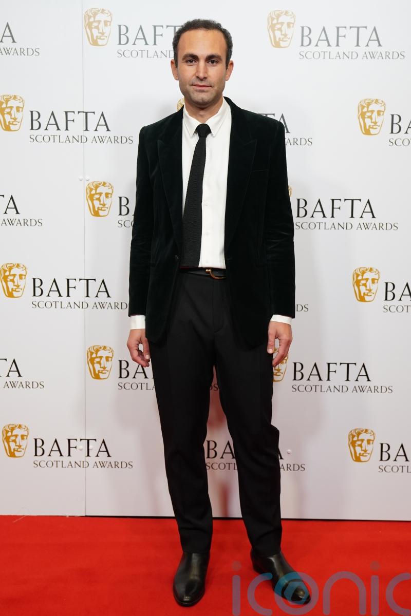 Khalid Abdalla scatters 14,000 sequins at Bafta TV awards in anti-war message