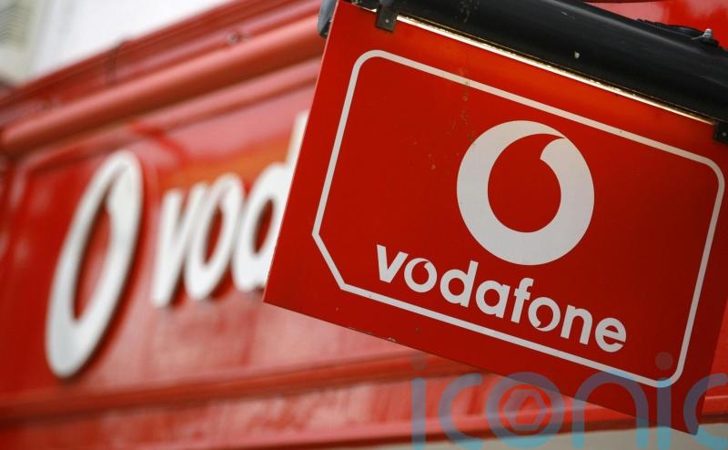 Vodafone returns to growth after cost cuts, as Three merger talks continue