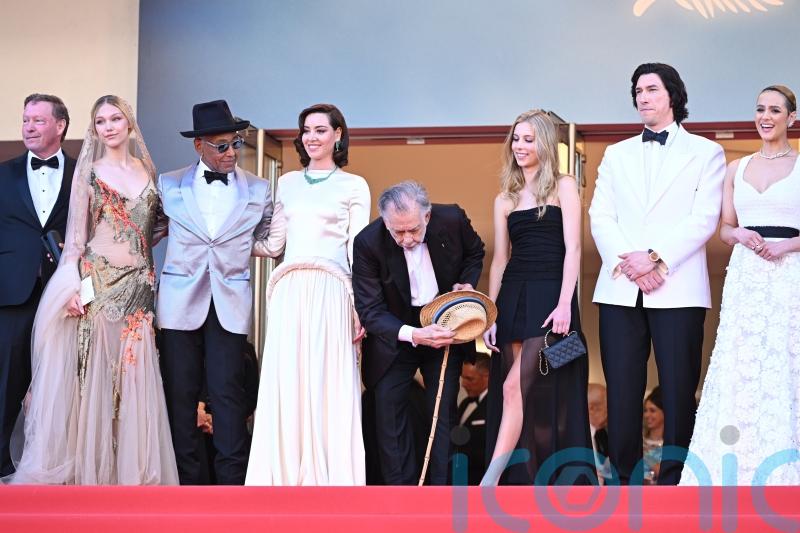 Francis Ford Coppola salutes the crowd at world premiere of Megalopolis