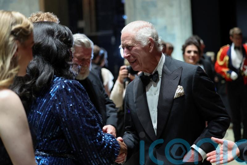 King applauded on Royal Opera House stage hand in hand with performers