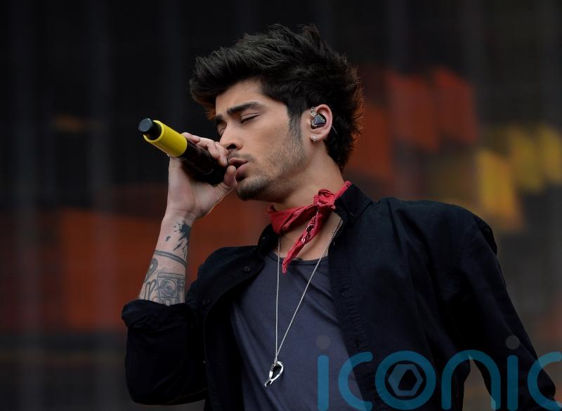 Zayn Malik tells screaming fans ‘I’ve missed this’ during debut UK solo show