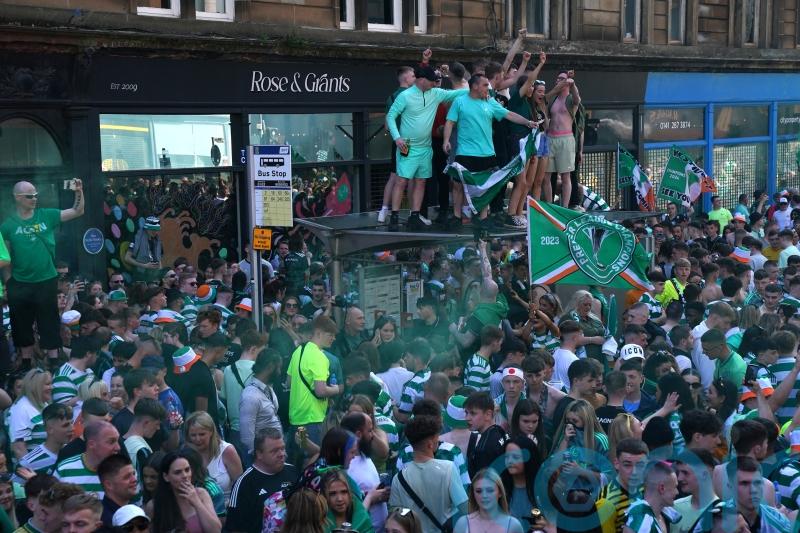 Police arrest 19 as 25,000 gather for Celtic title celebrations