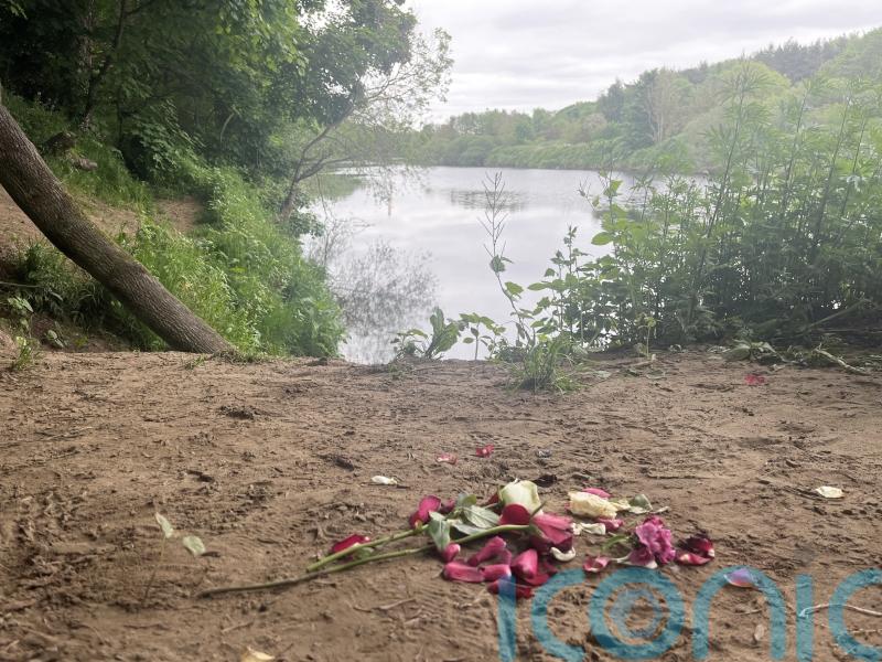 Flowers left on banks of the Tyne close to where 14-year-old boy died