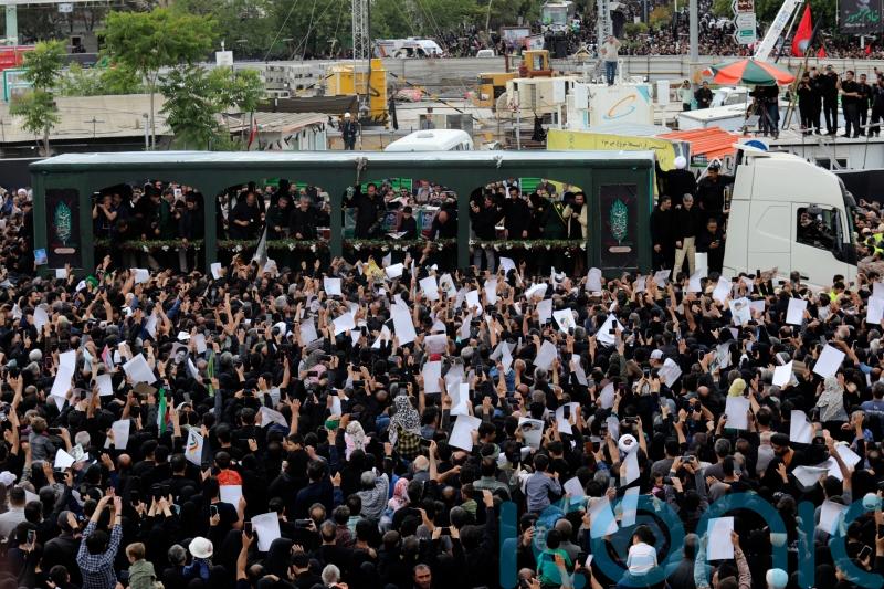Iran begins burying late president and others killed in helicopter crash