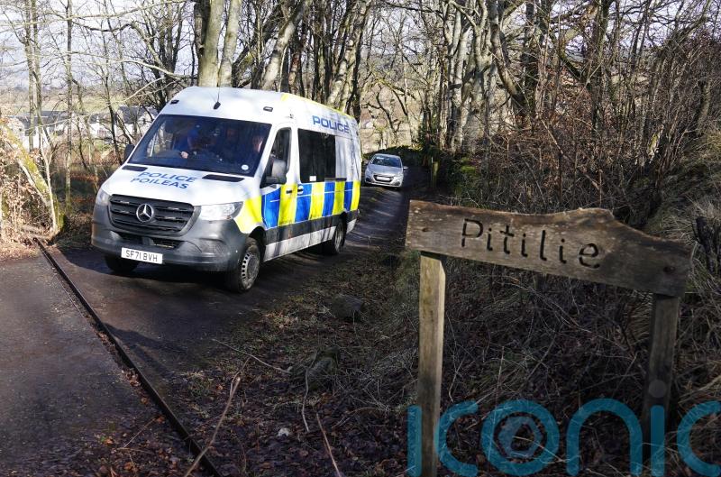 Man arrested over death of dog walker found on remote track