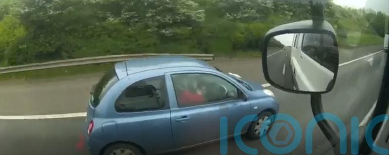 Woman applying make-up among unsafe motorway drivers caught on camera by police