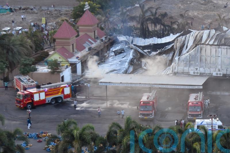 Four children among at least 27 dead in fire at amusement park in western India