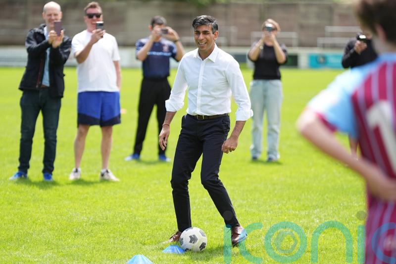 Sunak shows off his football skills with young players on campaign trail