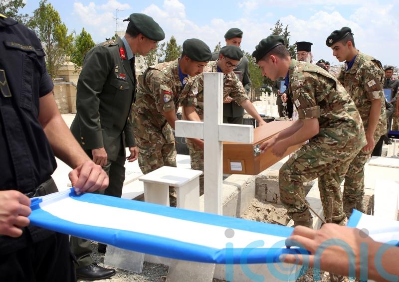 Families reclaim remains of 15 Greek soldiers killed in Cyprus in 1974