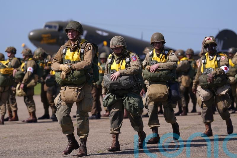 Parachutists fly from Duxford Air Show to D-Day commemorations in Normandy