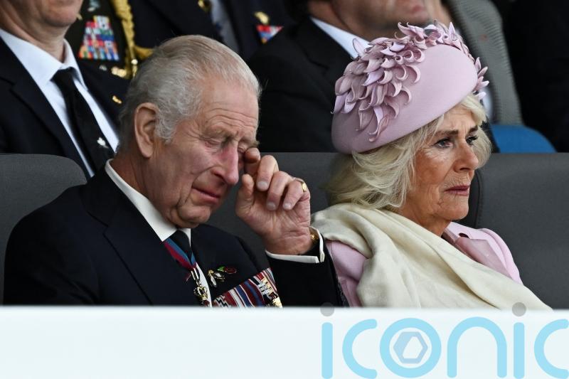 King and Queen appear emotional as Charles pays tribute to D-Day veterans