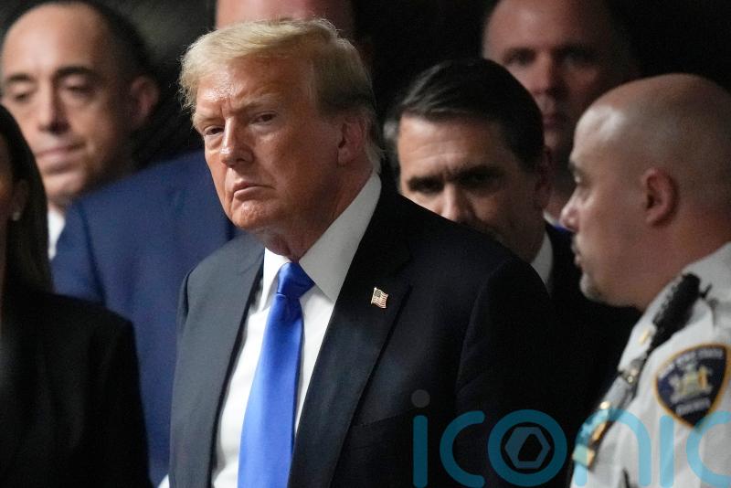 Judge strikes wording from Trump documents case but will not dismiss charges