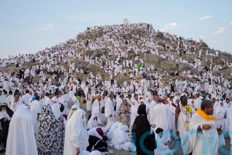 Muslim pilgrims converge at Mount Arafat for worship as Hajj reaches its peak