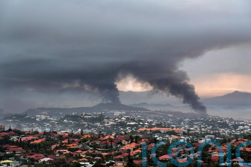 New Caledonia reopening airport and shortening curfew as unrest continues to ebb