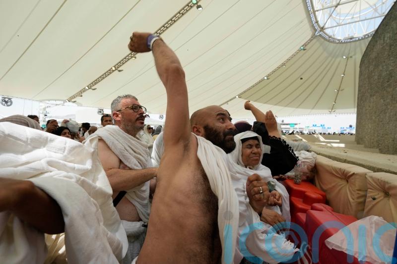 Muslim pilgrims wrap up Hajj with symbolic stoning of the devil amid deadly heat