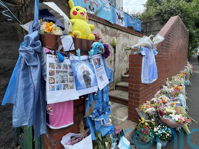 Man arrested over death of 12-year-old as hunt for second suspect continues