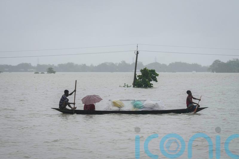 Floods and landslides triggered by heavy rains in India kill at least 16 people