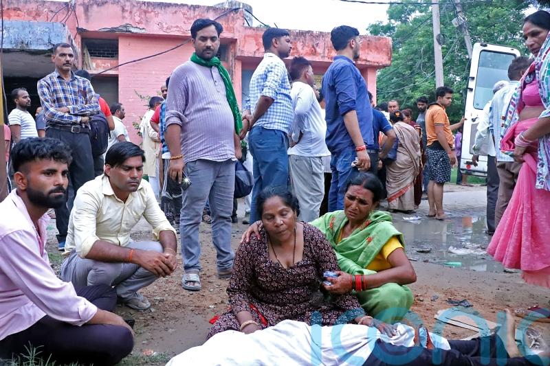 At least 100 people killed in stampede at religious event in India