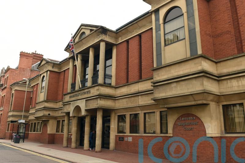 Three men in court charged with burglary after woman found dead at property