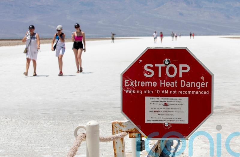 Hundreds of tourists drawn to Death Valley despite life-threatening heatwave