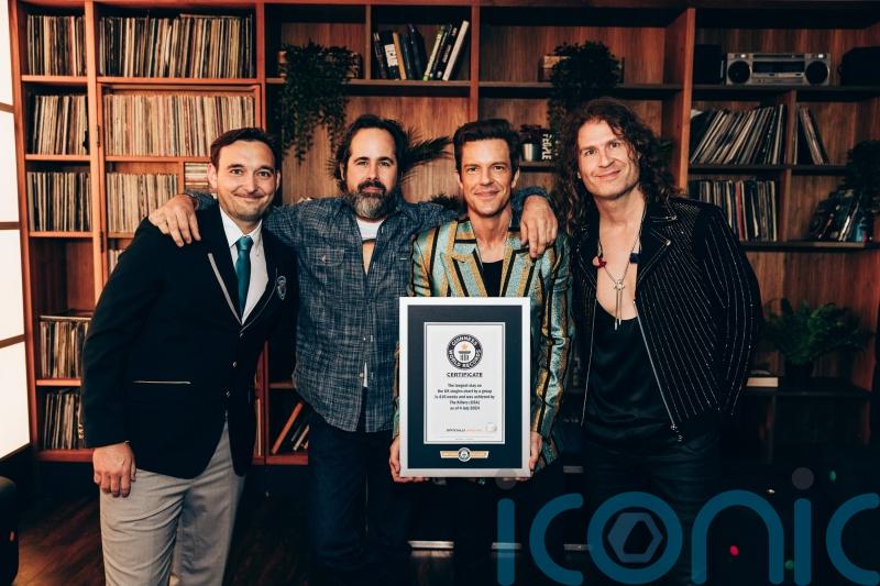 The Killers presented with two Guinness World Records titles for Mr Brightside