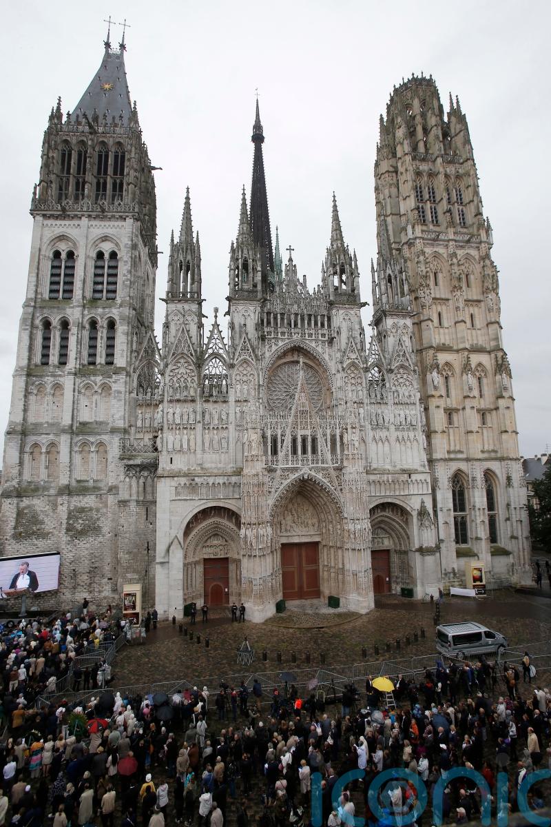Fire in spire of medieval cathedral in French city of Rouen under control