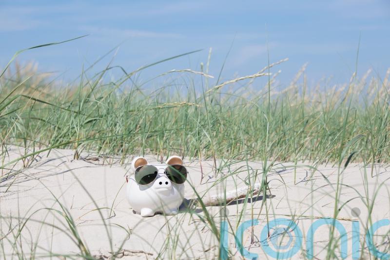 How to avoid blowing your budget while you’re on holiday this summer
