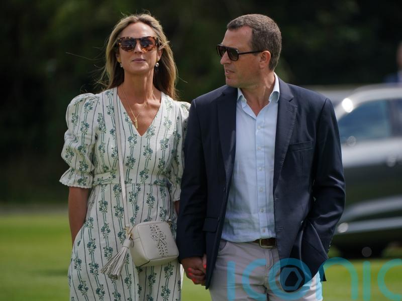 Peter Phillips and girlfriend watch William triumph in charity polo cup