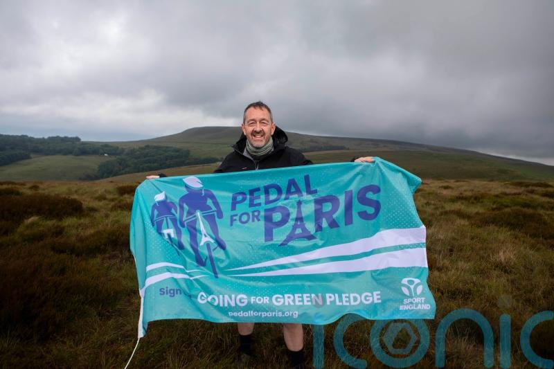 Former Olympic champion cycling to Paris for climate change awareness