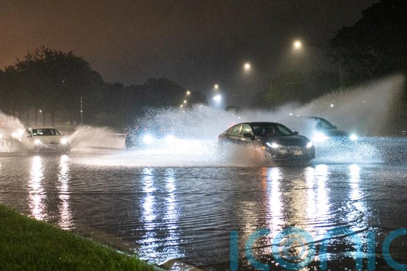 Dam fails in Illinois as US states hit by heavy rain and tornadoes