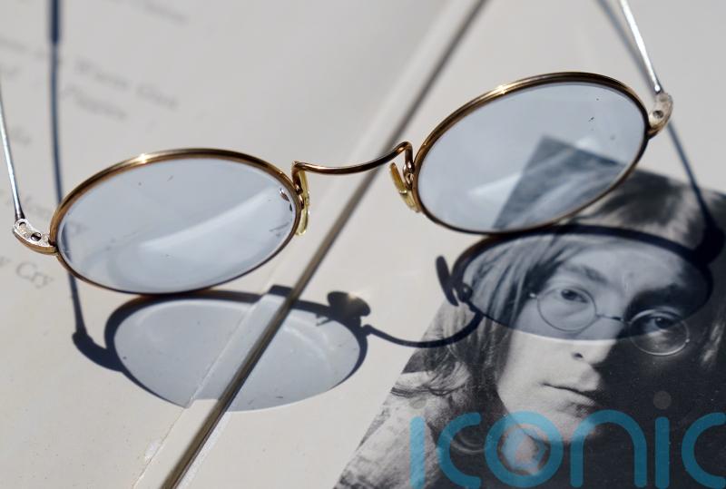 Blue-tinted glasses given by John Lennon to be auctioned with Abbey Road photos