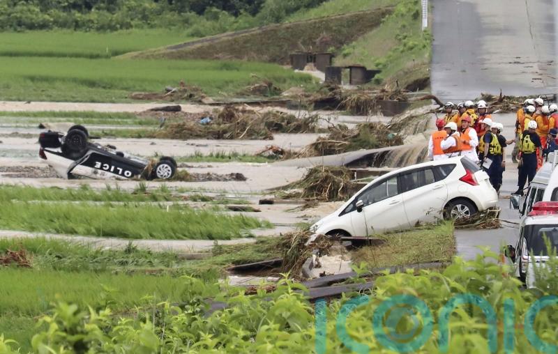 Hundreds flee as heavy rain in northern Japan triggers floods and landslides